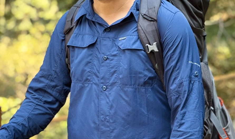 Showing Hiking shirt velcro pockets on hiking terrain