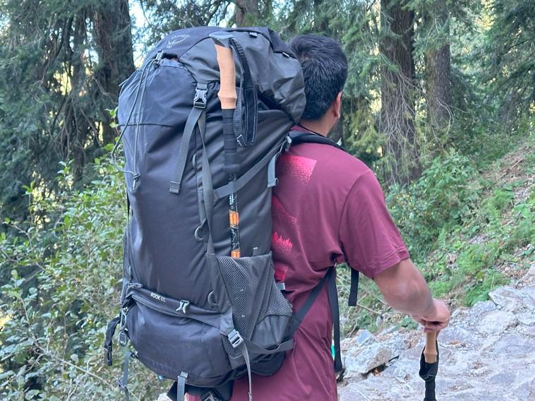 Backpacking Backpacks -showing properly fitted backpack on forest trail. 