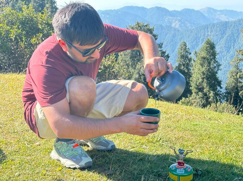 Backpacking stoves (pouring water from kettle to mug)