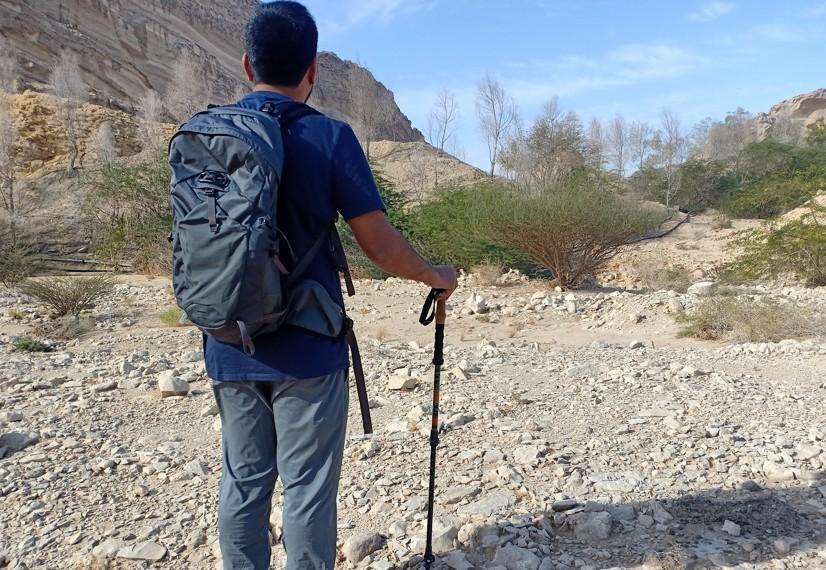 daypack - this shot shows the proper fitting daypack on desert hiking trail.